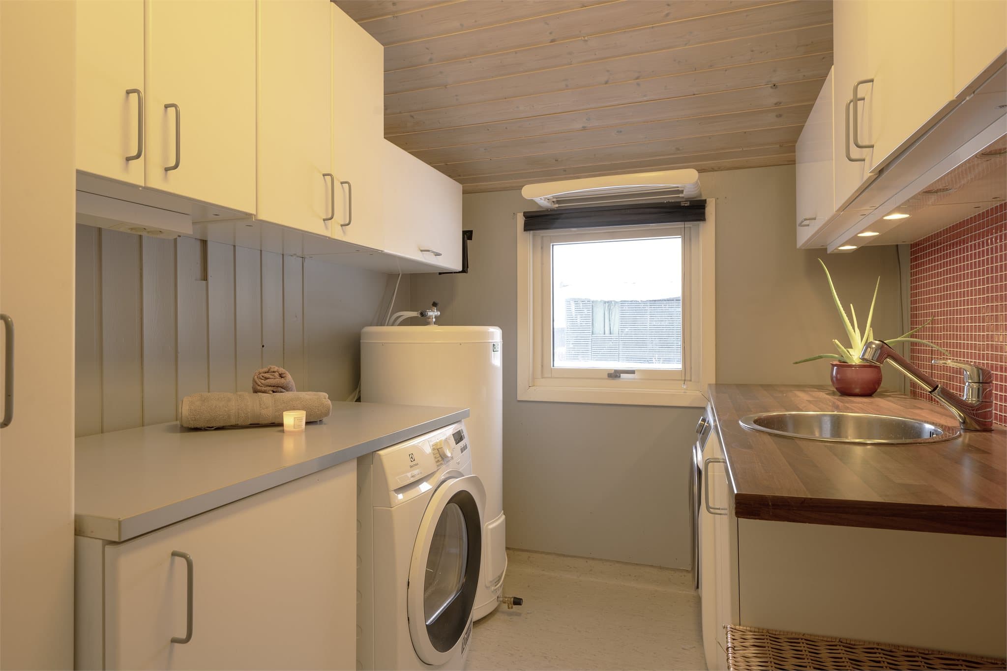 Vaskerom i tilknytning til kjøkken.