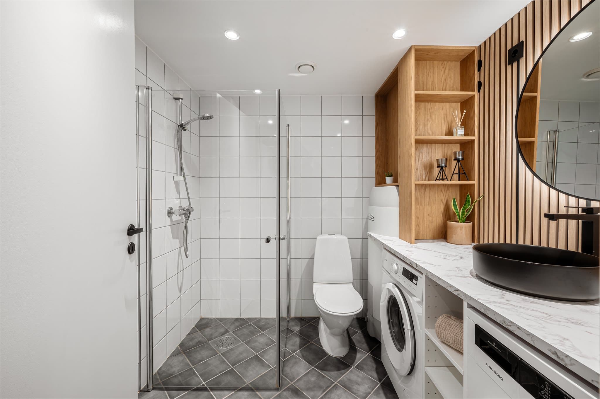 - Helfliset bad som måler 4,8m² -