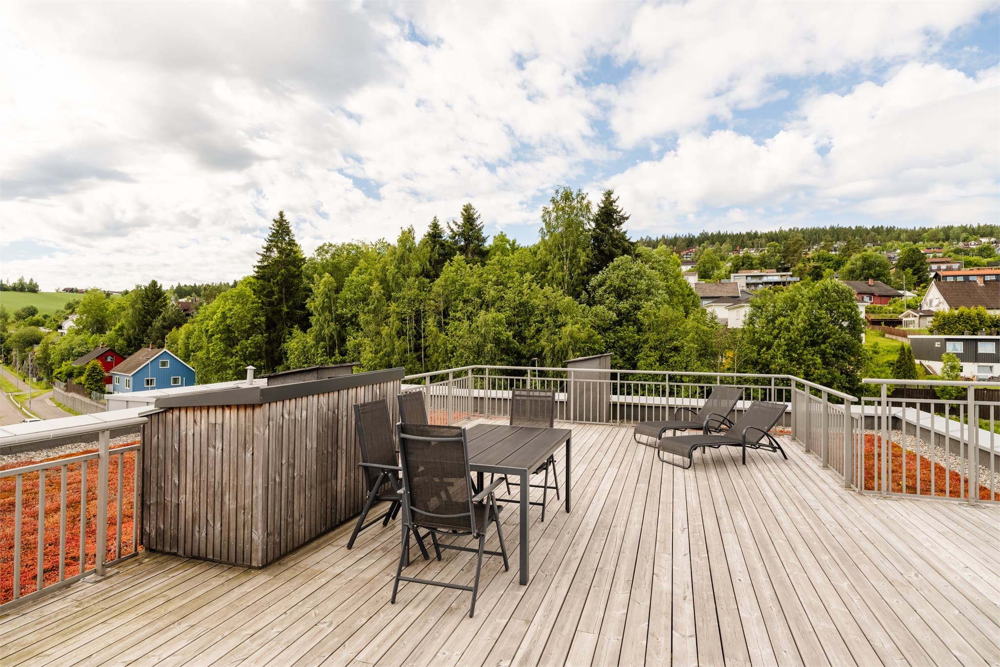 Beboerne har tilgang til en stor, felles takterrasse.