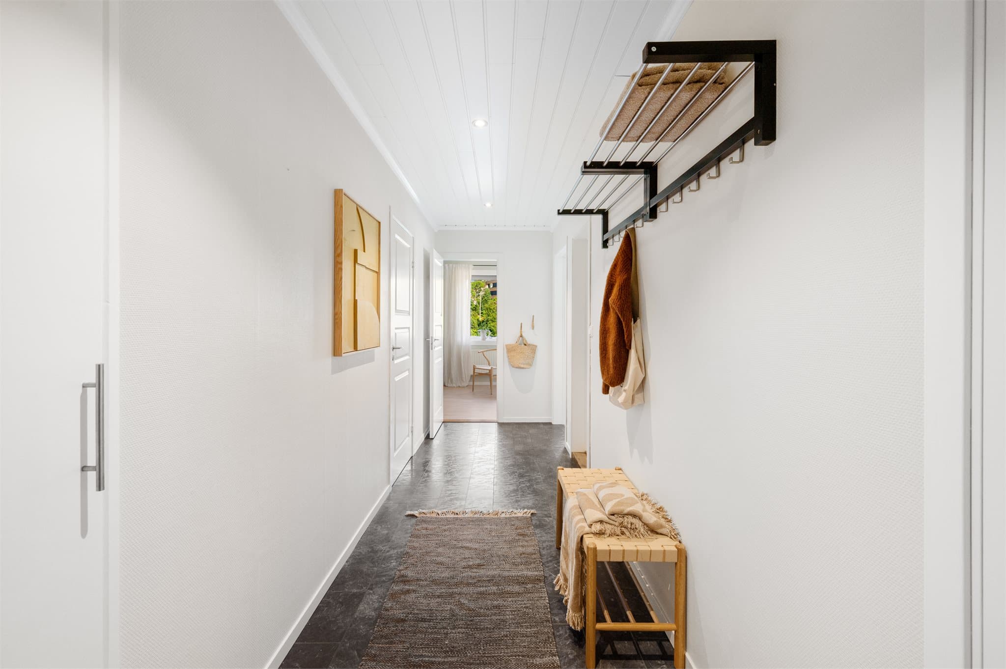 - Entréen måler 8,3 m² -