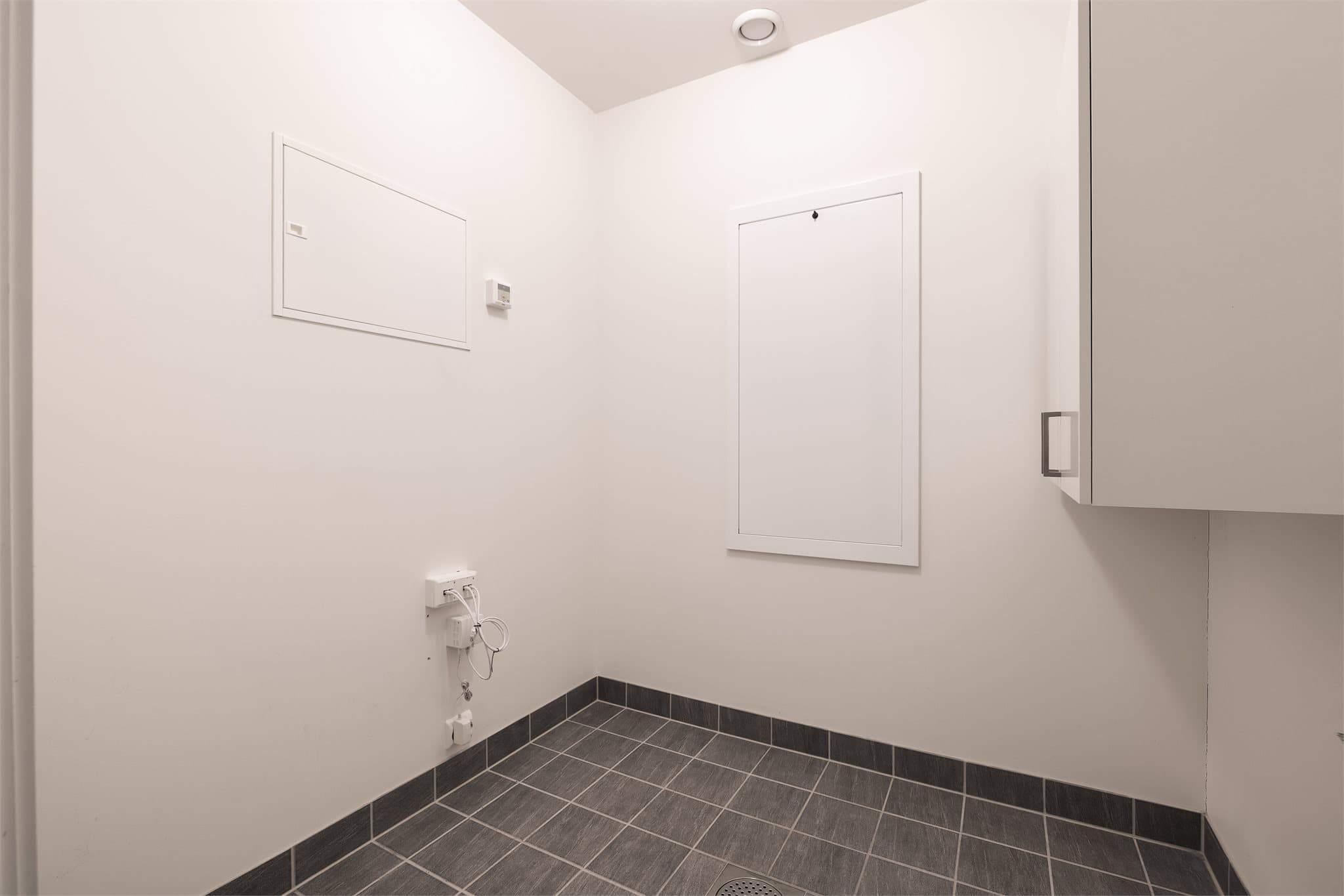 Bod på 3,4 m² med flislagt gulv