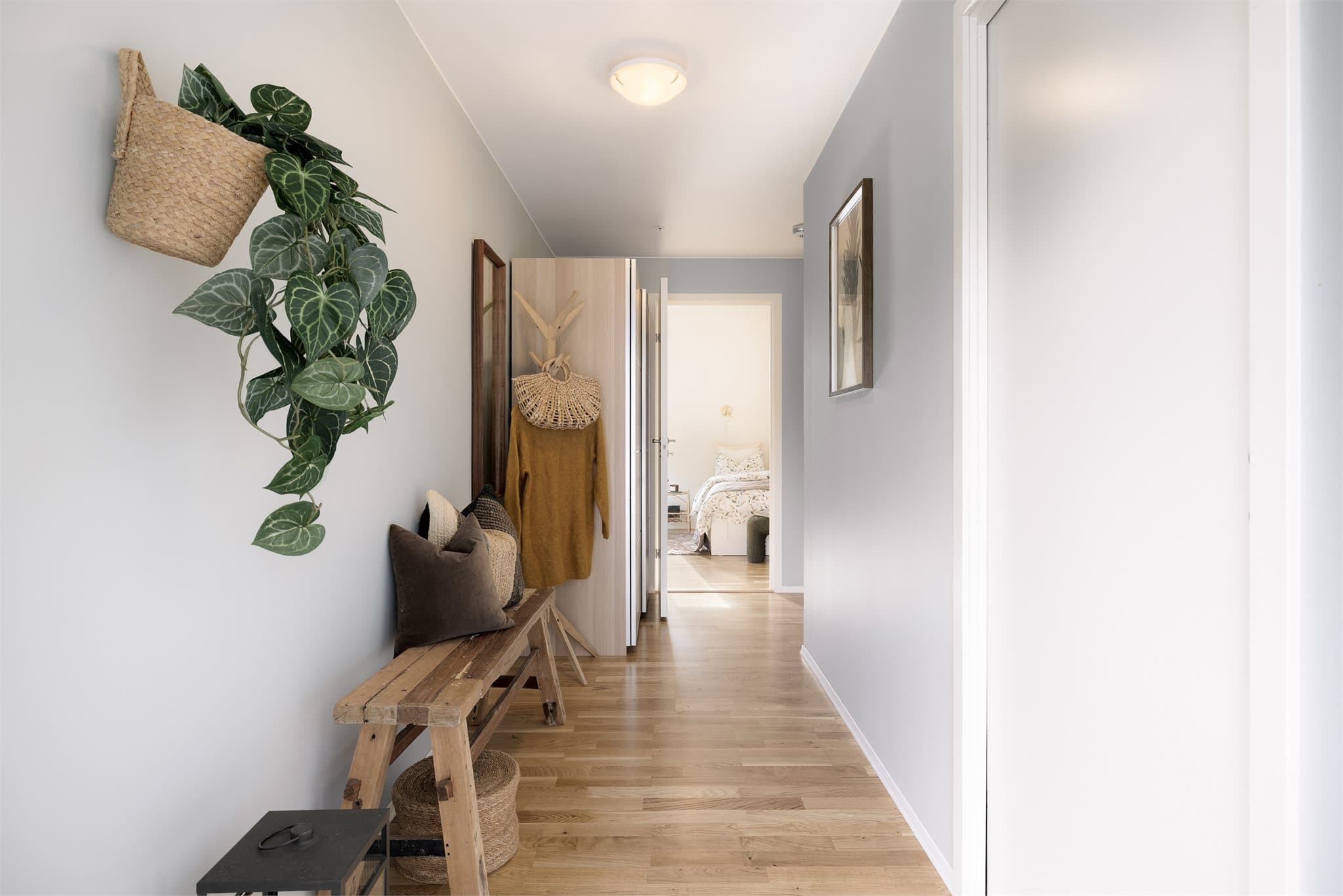 Entré og gang har et totalt areal på 13,6 m²