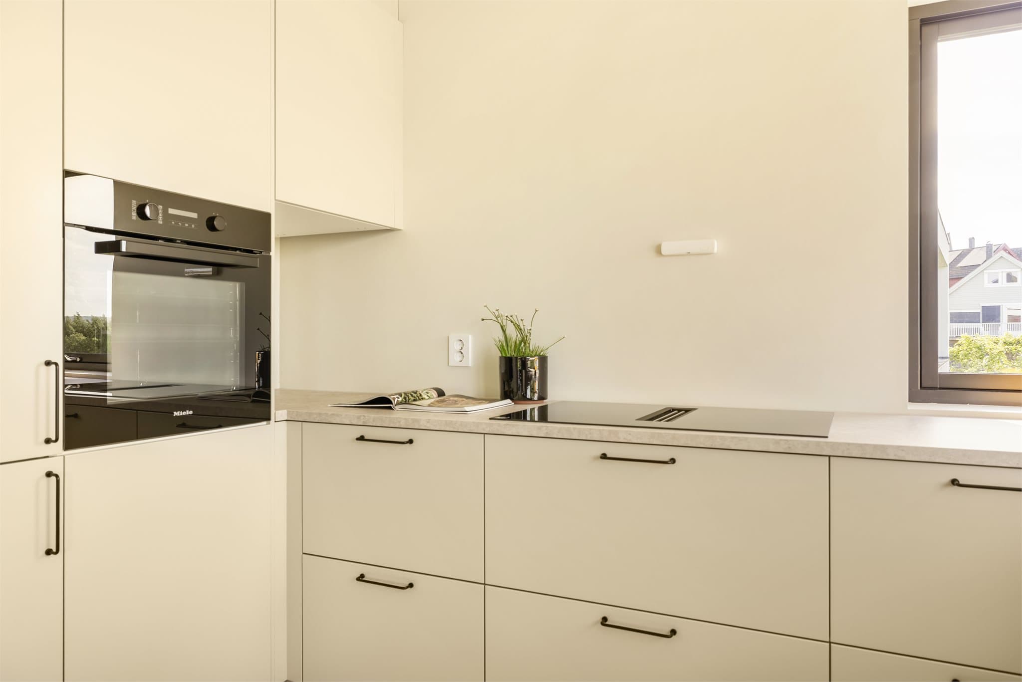 Miele induksjonstopp med integrert og støysvak ventilator.