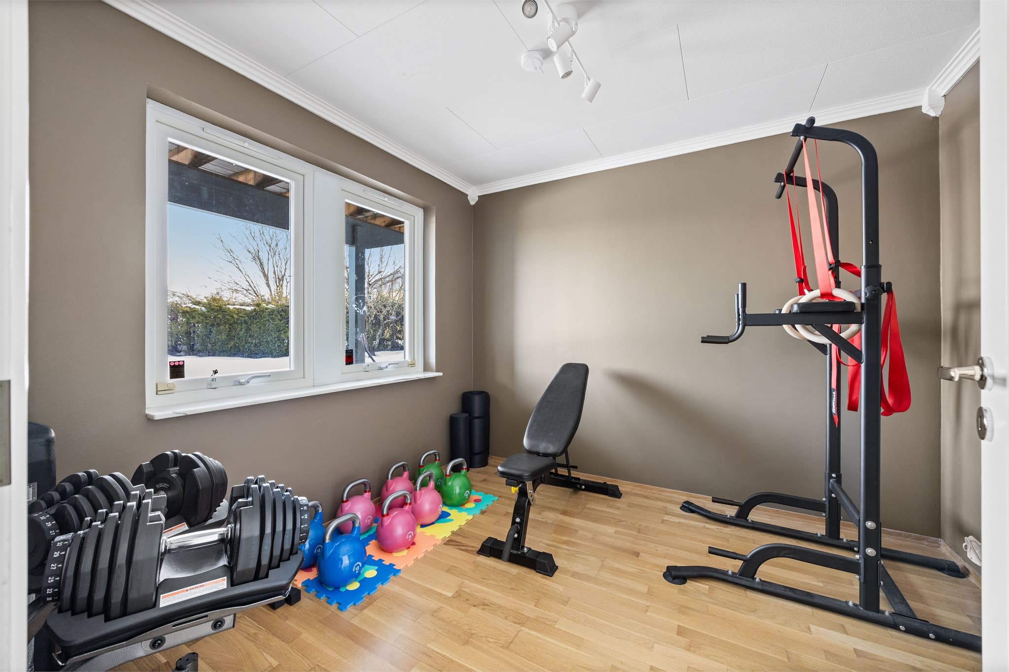 Det fjerde soverommet er i dag innredet som treningsrom, men kan ha mange bruksområder.