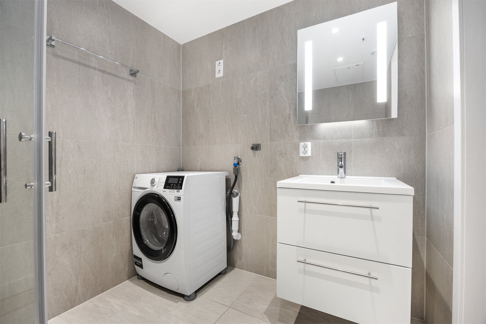 Badet har også opplegg for vaskemaskin.