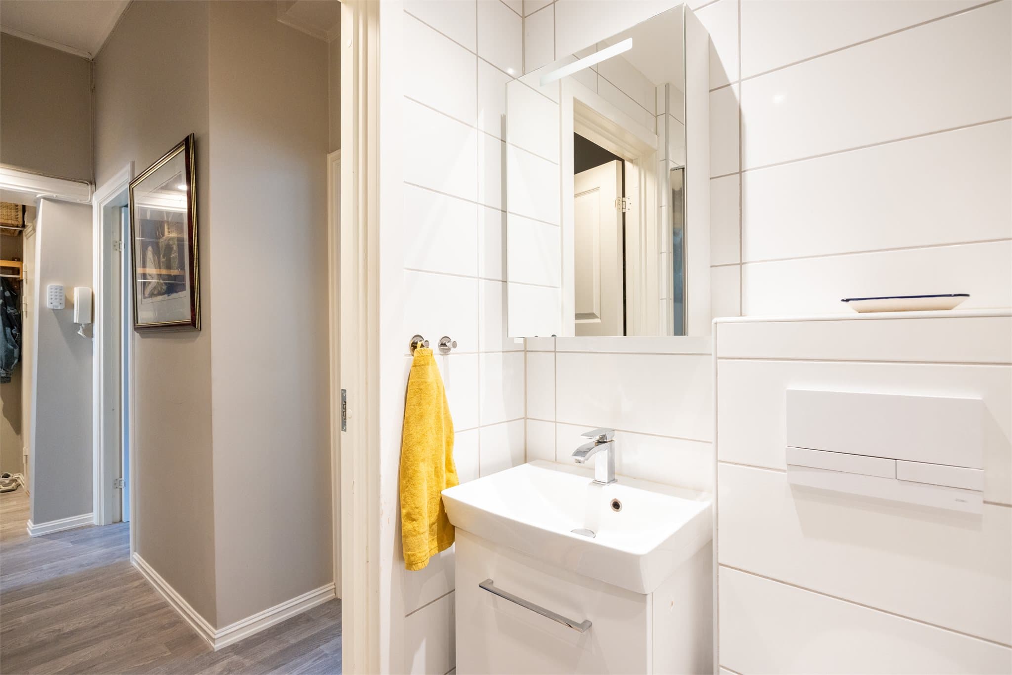 Flislagt bad med varme i gulvet.