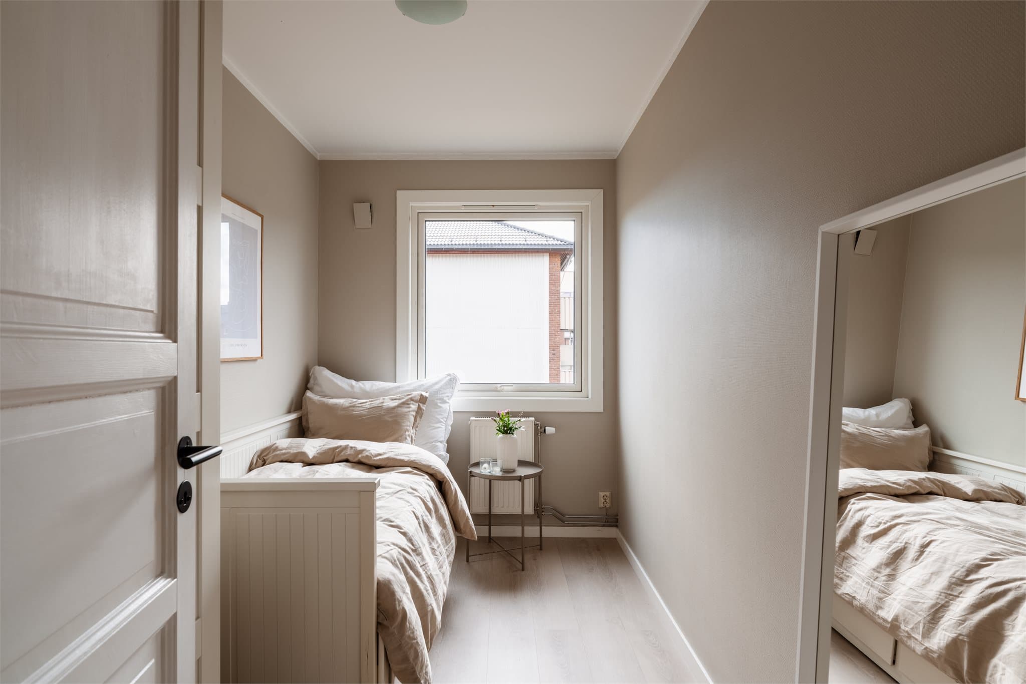 Soverom ll. Planløsning som er tilpasset for å gi leiligheten tre gode soverom.