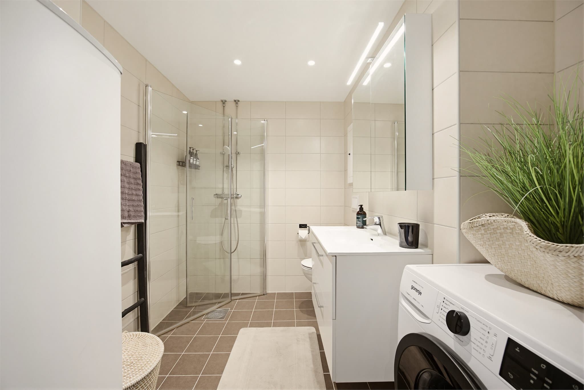 Badet ble pusset opp i regi av borettslaget under 2021 og har fått en moderne og praktisk løsning.