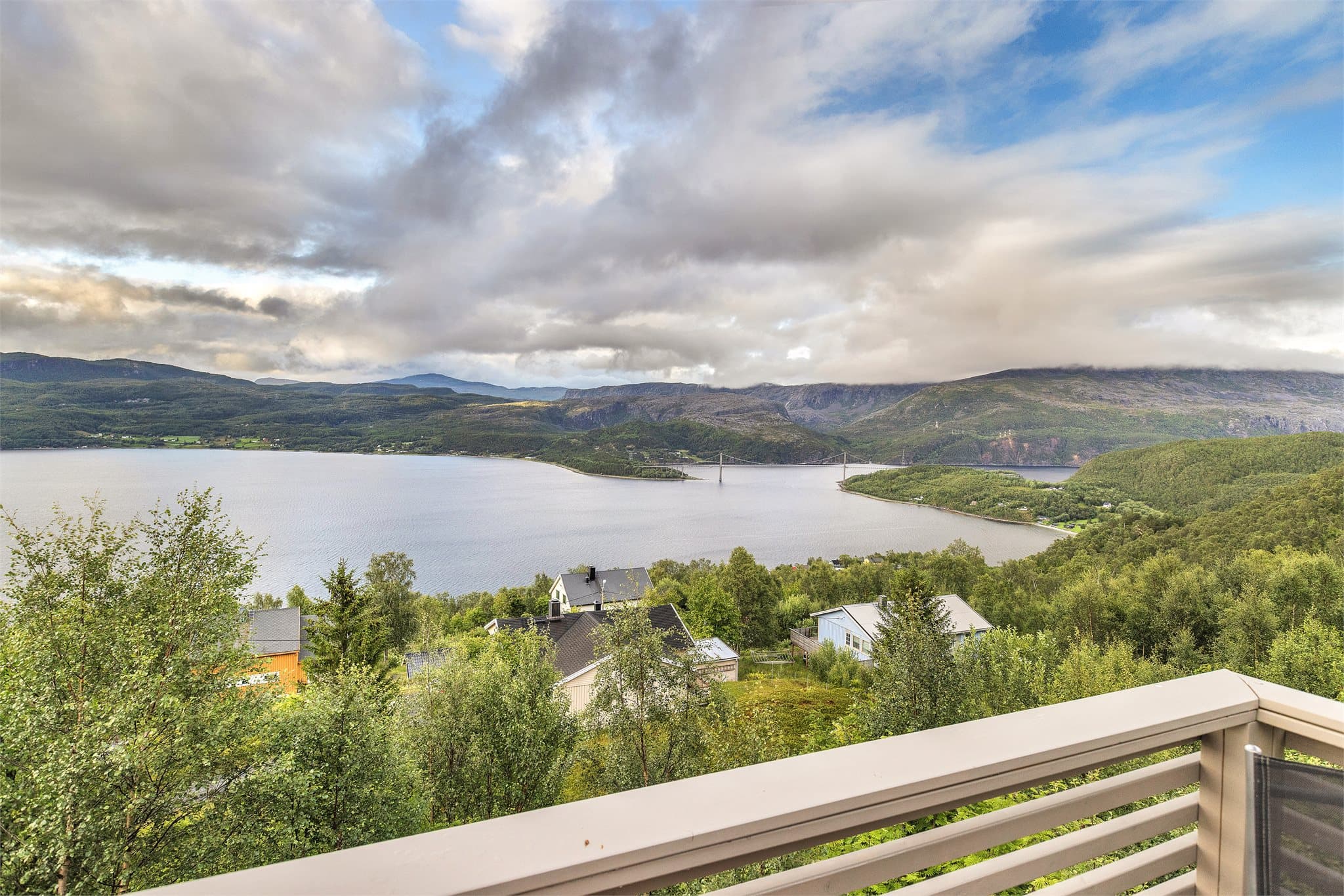Utsikt fra eiendommen mot fjorden Rombaken og Rombaksbruen.