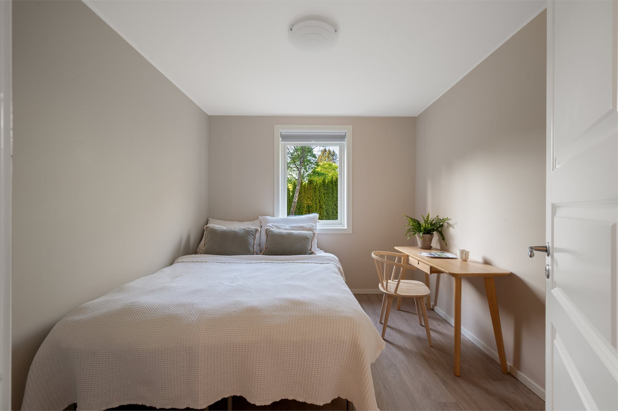 Leilighetens andre soverom måler 9,1 m²