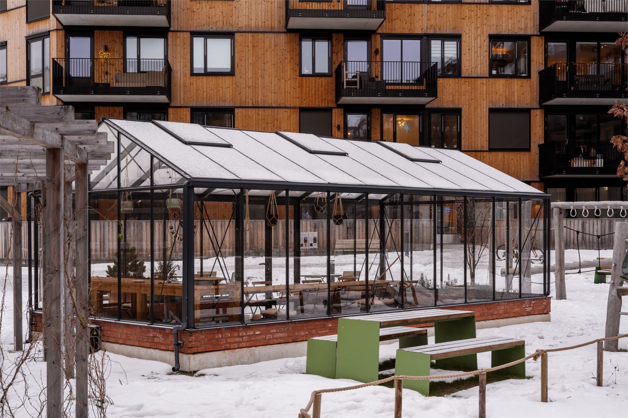 I fellesområdet finnes et drivhus som kan benyttes av beboerne.