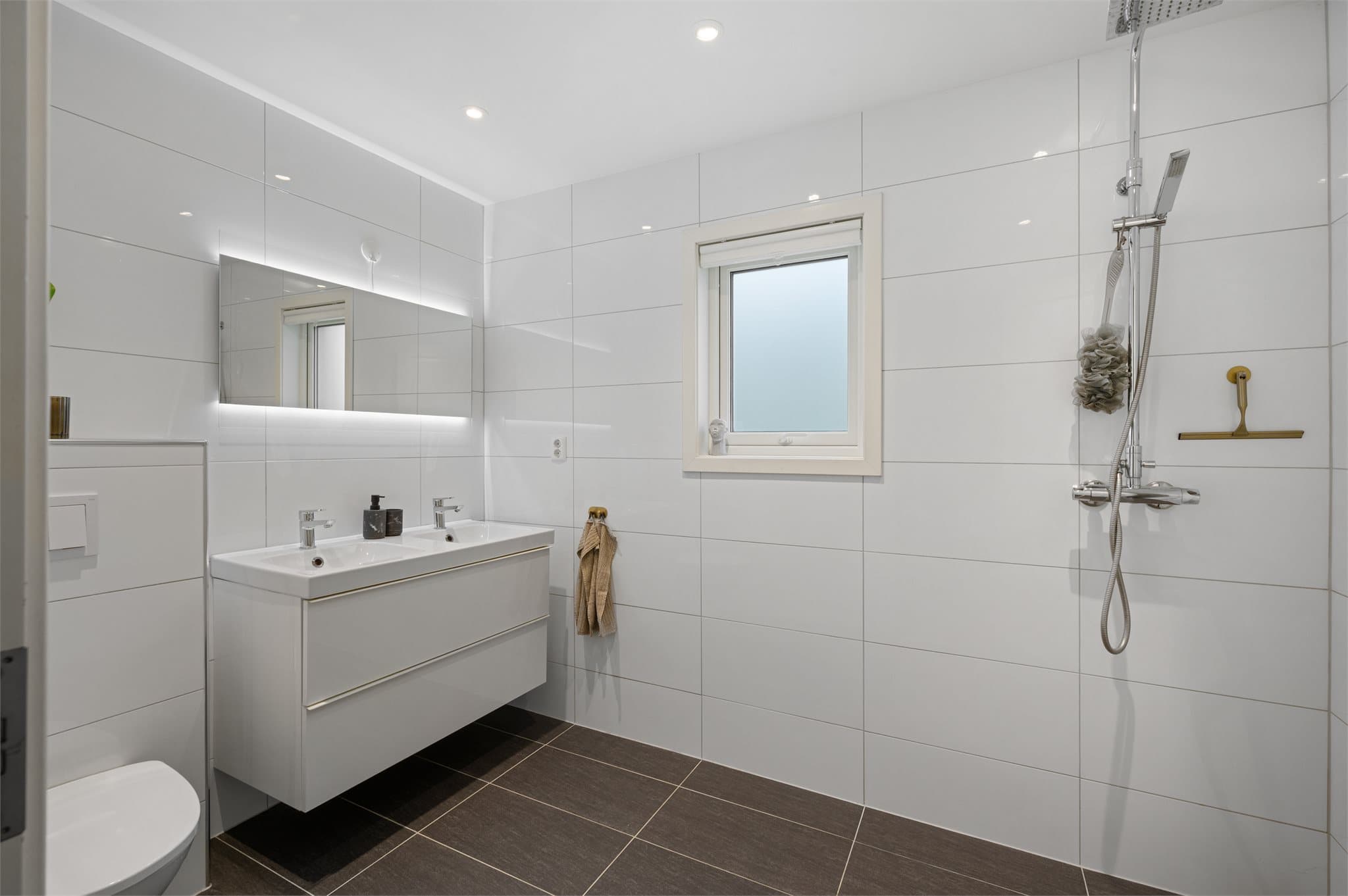 - Badet måler 5,4m² -