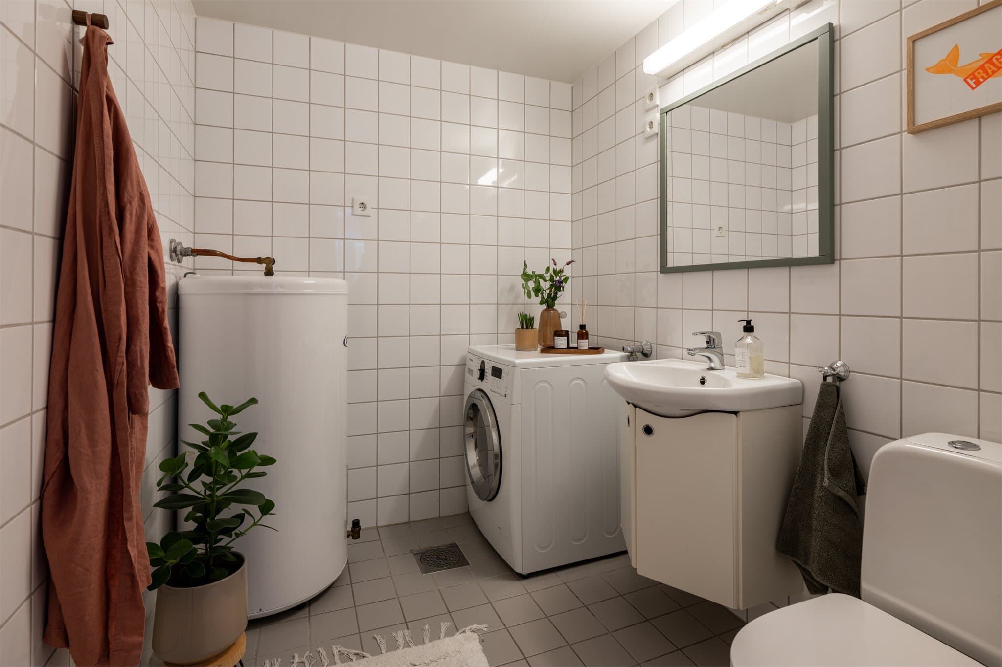 Et separat vaskerom med toalett forenkler hverdagslogistikken.