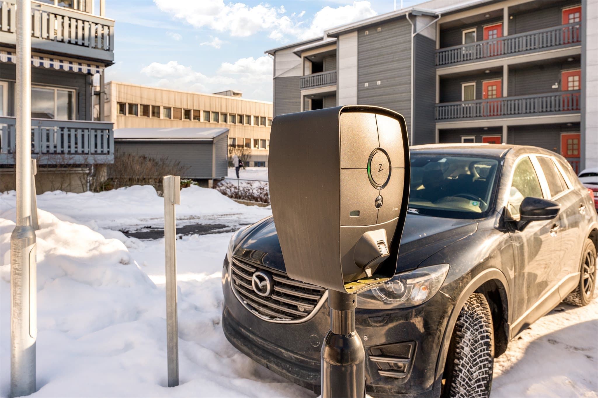 Egen parkeringsplass med elbillader.