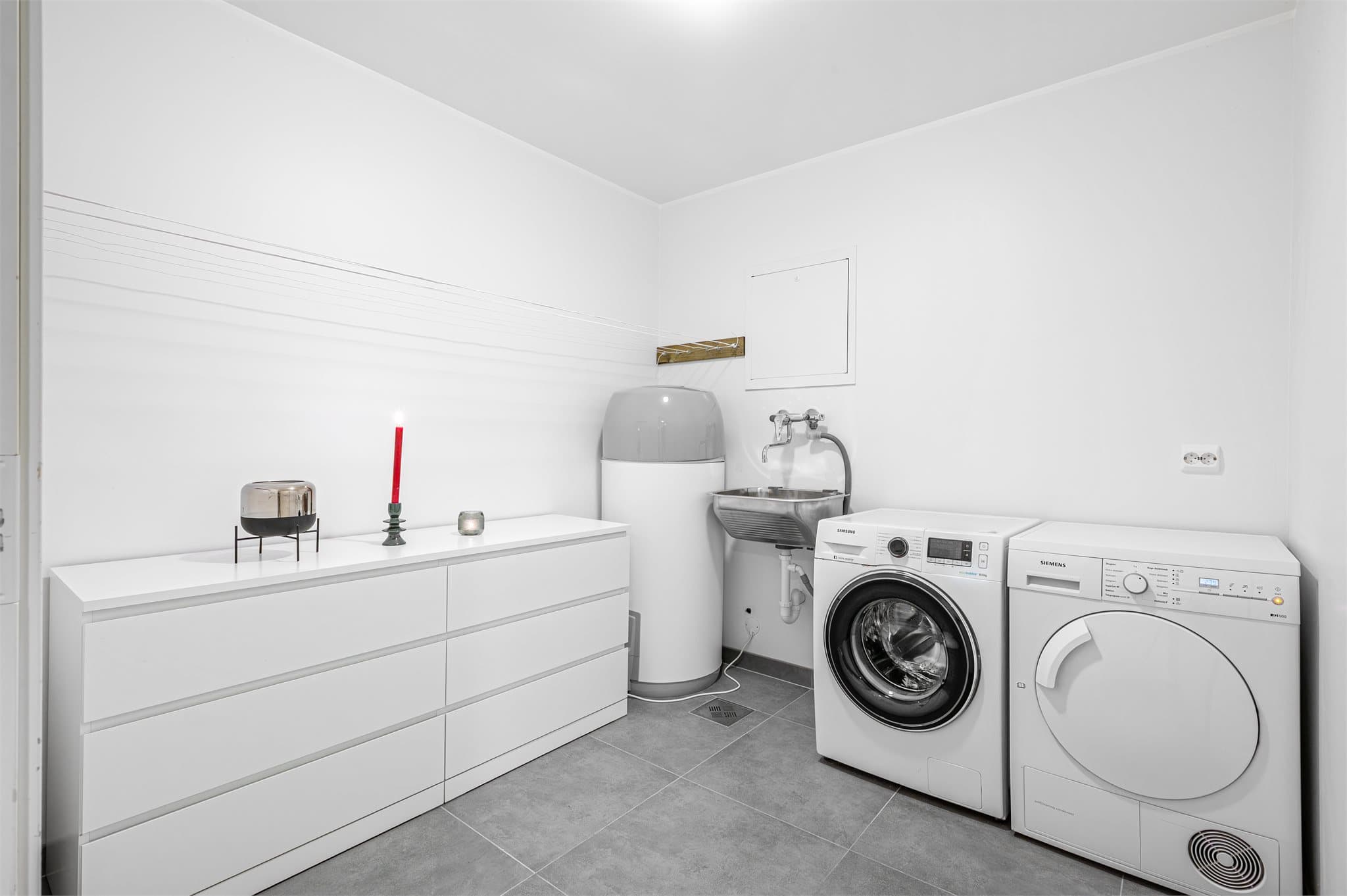 - Svært praktisk med eget vaskerom som måler 6,3m² -